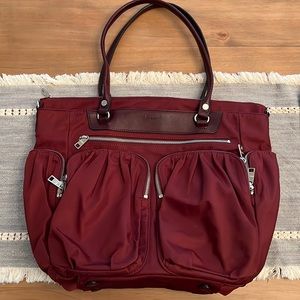 Mz Wallace Abbey Tote. VGUC. Burgundy red wine with silver hardware pomegranate